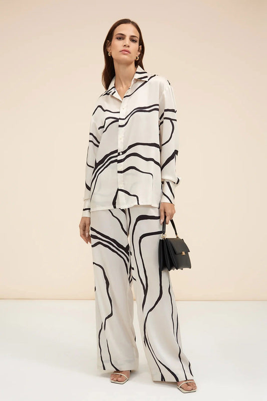 Black abstract pattern co-ord set with wide leg pants and button up shirt fashionable womenswear