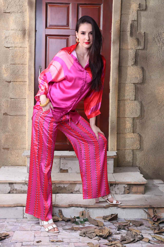 Fuchsia silk co-ord set with feather print design, perfect for fashion forward attire