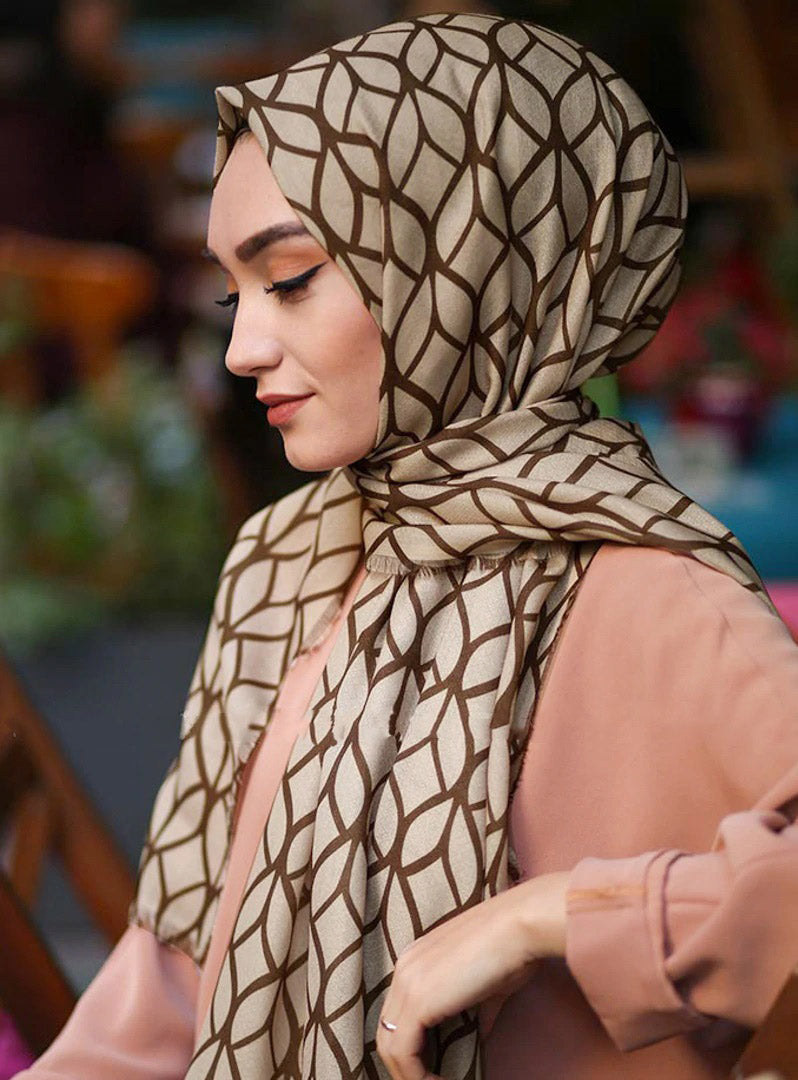 Beige Color Hijab in rich hues, featuring intricate patterns for a sophisticated look, combining style with modesty for the fashion conscious