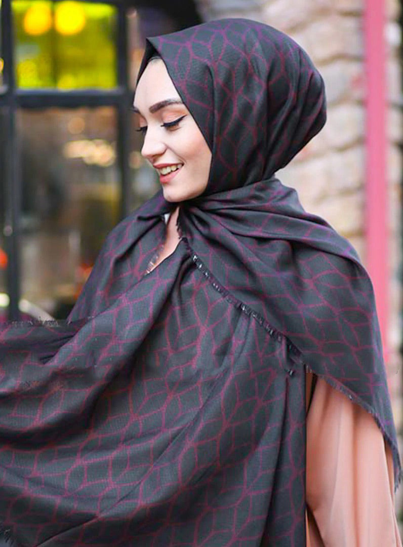 Black Color Hijab in rich hues, featuring intricate patterns for a sophisticated look, combining style with modesty for the fashion conscious