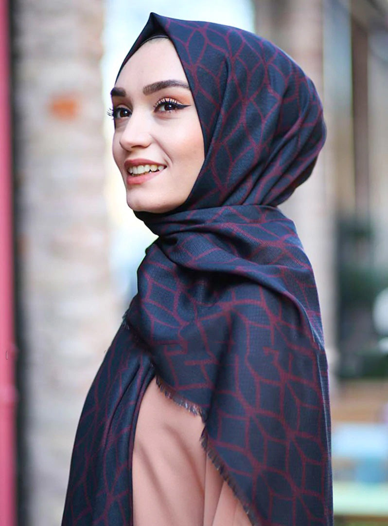 Black Color Hijab in rich hues, featuring intricate patterns for a sophisticated look, combining style with modesty for the fashion conscious