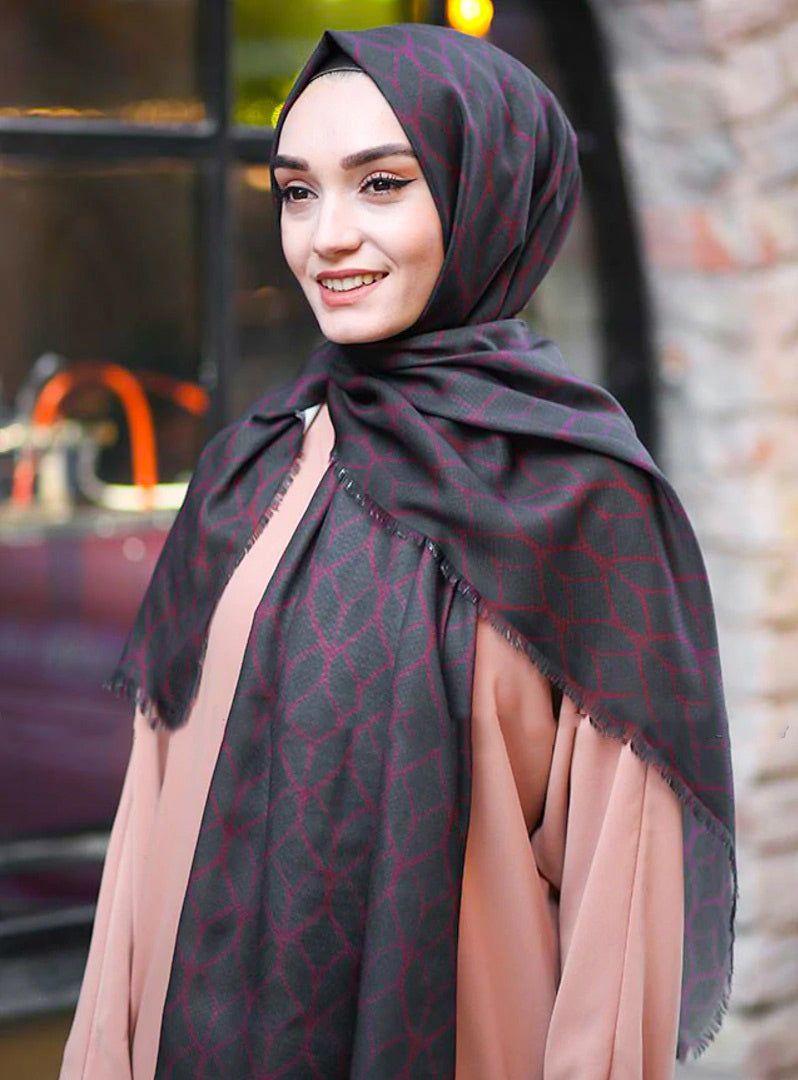 Black Color Hijab in rich hues, featuring intricate patterns for a sophisticated look, combining style with modesty for the fashion conscious