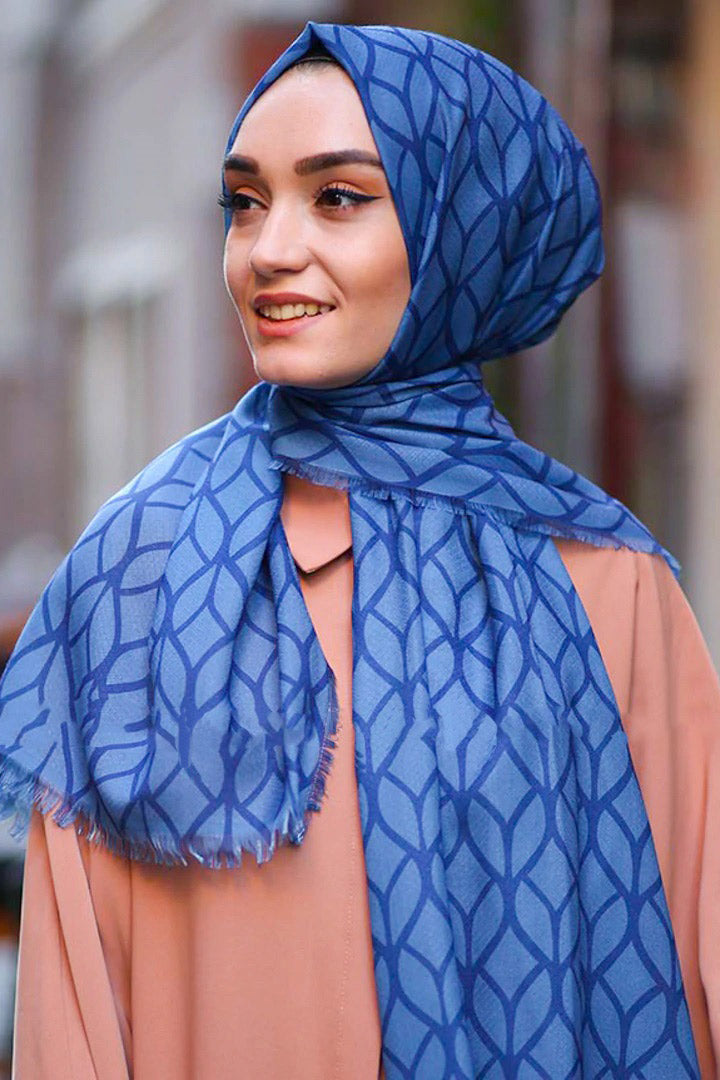 Blue Color Hijab in rich hues, featuring intricate patterns for a sophisticated look, combining style with modesty for the fashion conscious