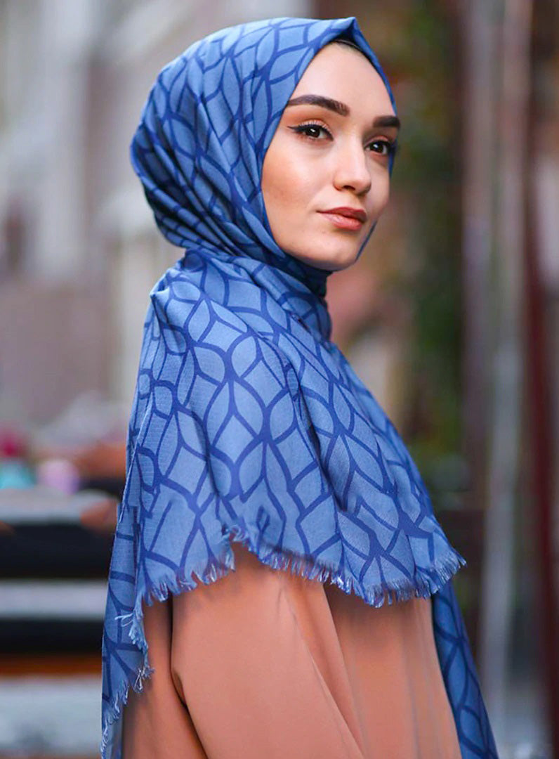 Blue Color Hijab in rich hues, featuring intricate patterns for a sophisticated look, combining style with modesty for the fashion conscious