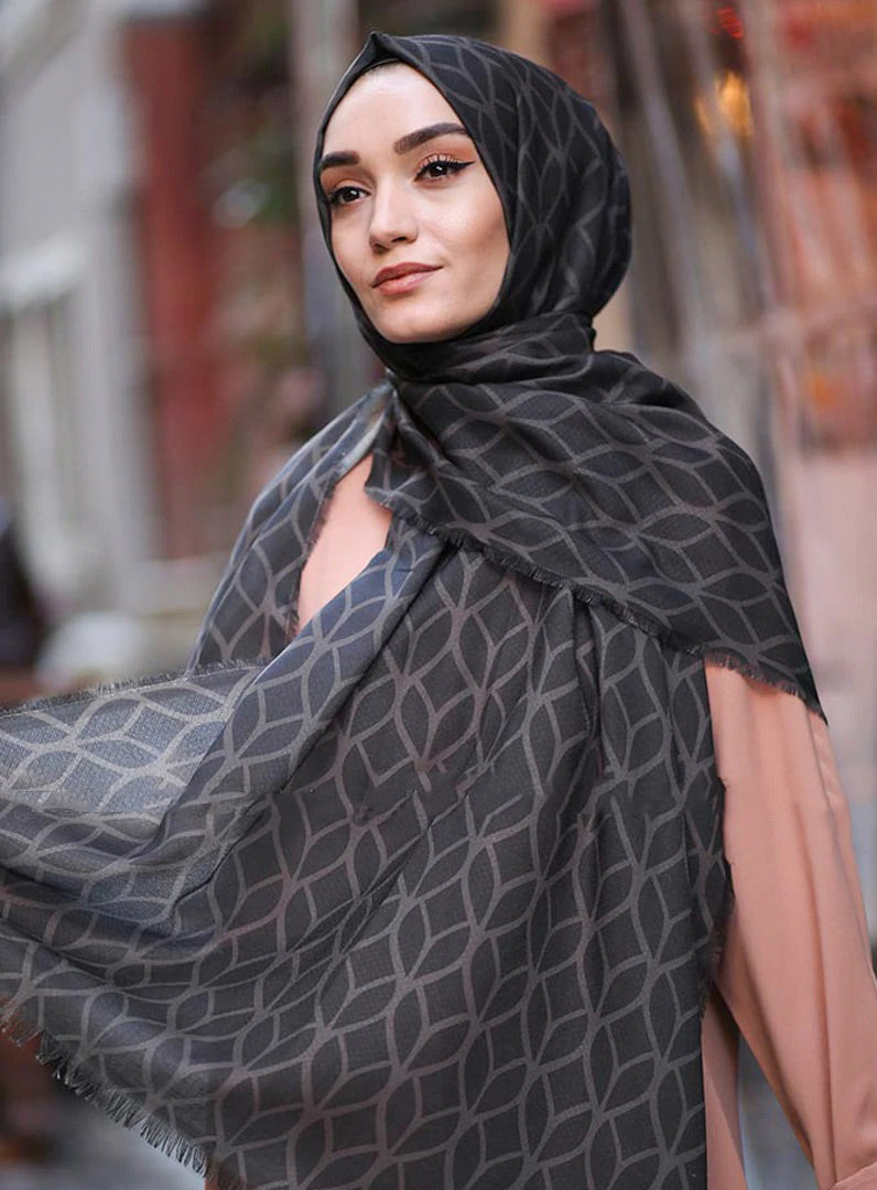 Dark Grey Color Hijab in rich hues, featuring intricate patterns for a sophisticated look, combining style with modesty for the fashion conscious