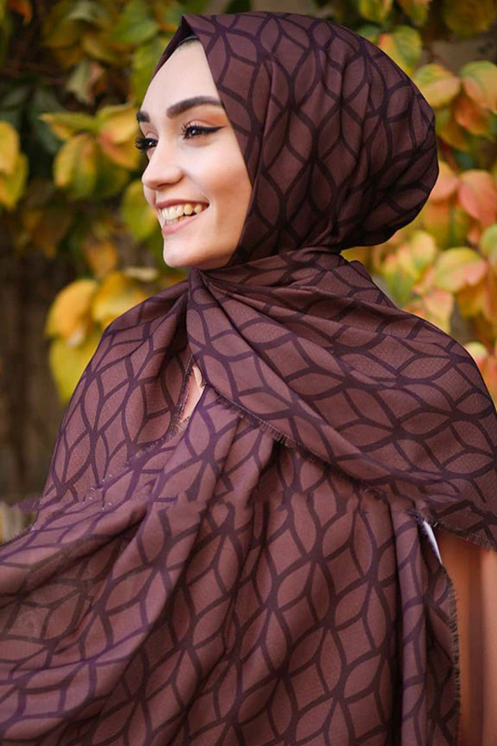 Magenta Color Hijab in rich hues, featuring intricate patterns for a sophisticated look, combining style with modesty for the fashion conscious