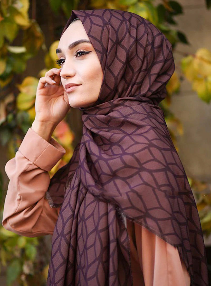 Magenta Color Hijab in rich hues, featuring intricate patterns for a sophisticated look, combining style with modesty for the fashion conscious
