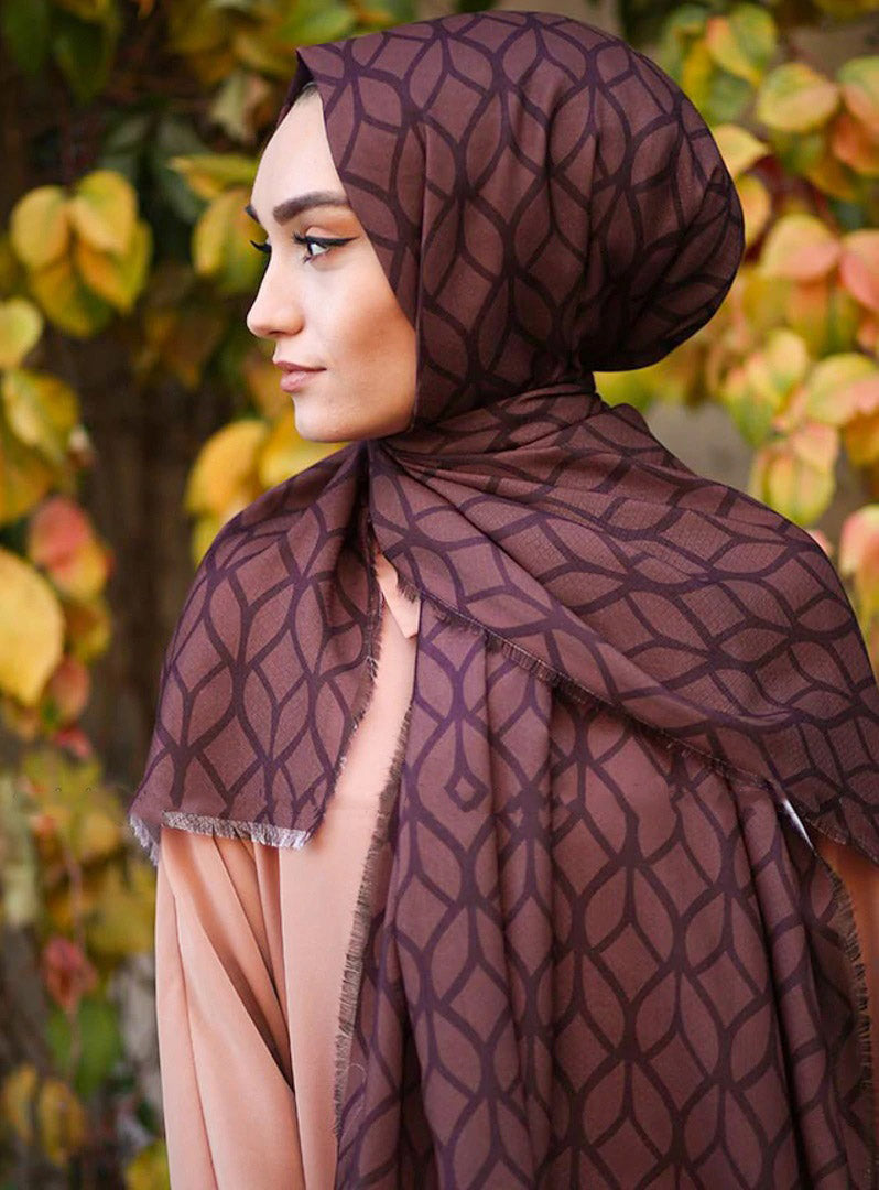 Magenta Color Hijab in rich hues, featuring intricate patterns for a sophisticated look, combining style with modesty for the fashion conscious