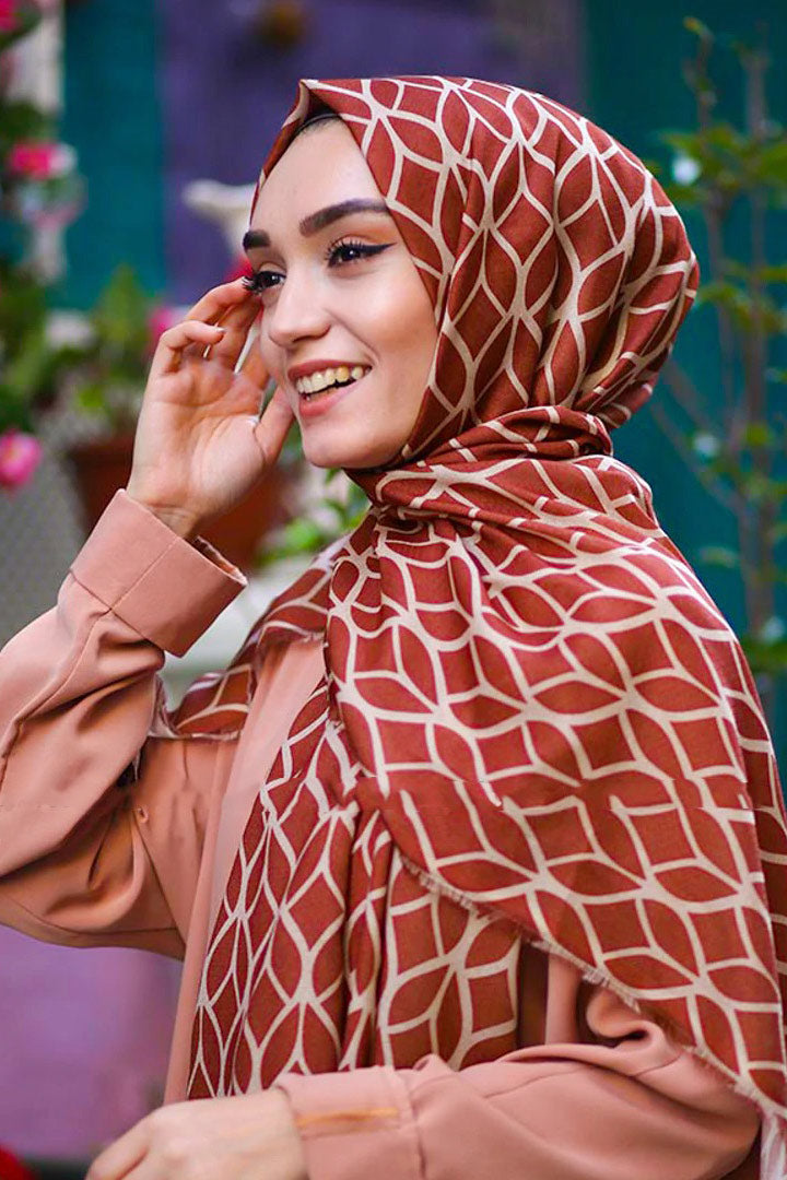 Mustard Color Hijab in rich hues, featuring intricate patterns for a sophisticated look, combining style with modesty for the fashion conscious