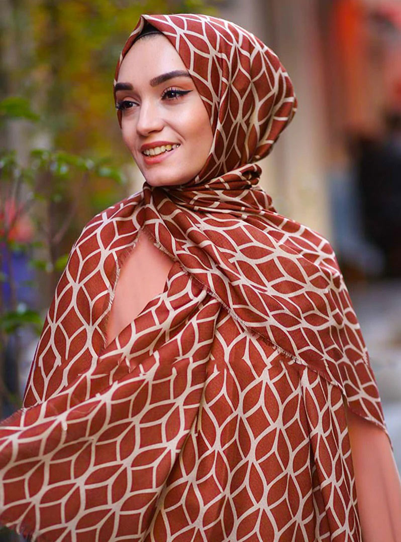Mustard Color Hijab in rich hues, featuring intricate patterns for a sophisticated look, combining style with modesty for the fashion conscious