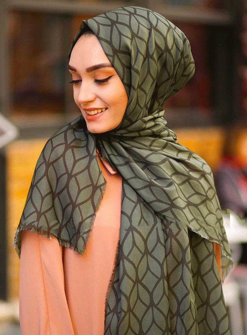 Olive Color Hijab in rich hues, featuring intricate patterns for a sophisticated look, combining style with modesty for the fashion conscious
