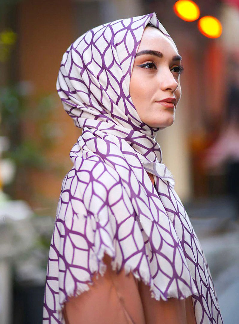 Purple Color Hijab in rich hues, featuring intricate patterns for a sophisticated look, combining style with modesty for the fashion conscious