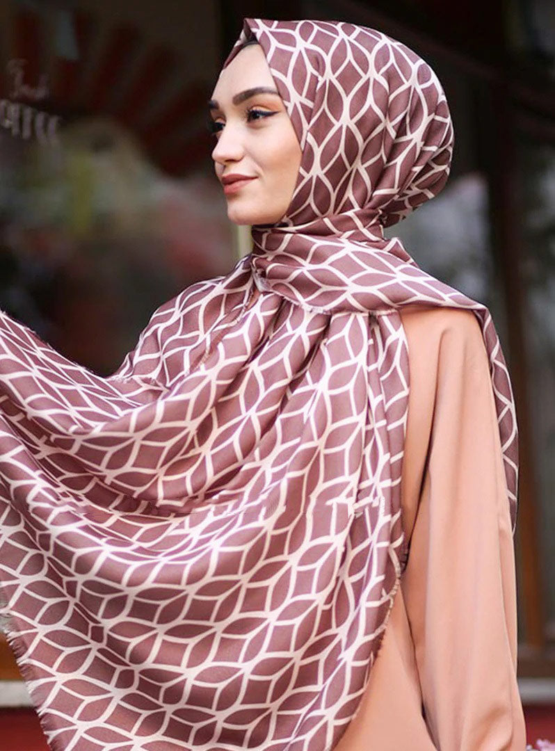 Salmon Color Hijab in rich hues, featuring intricate patterns for a sophisticated look, combining style with modesty for the fashion conscious