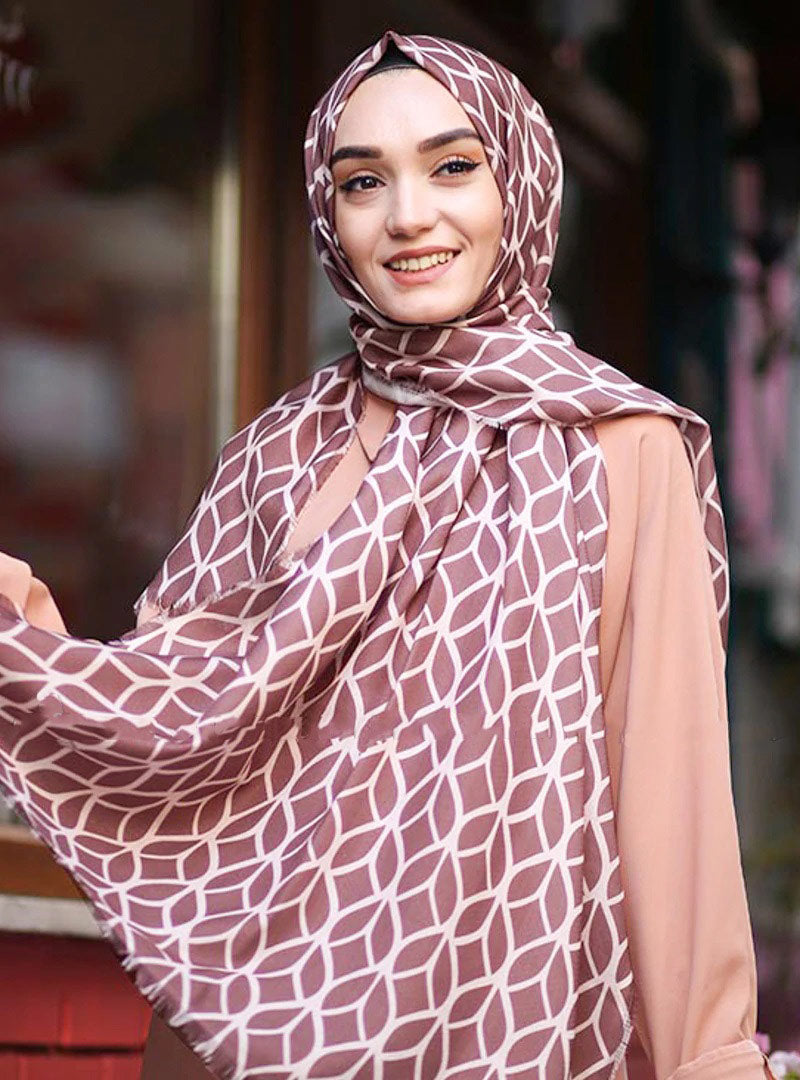 Salmon Color Hijab in rich hues, featuring intricate patterns for a sophisticated look, combining style with modesty for the fashion conscious