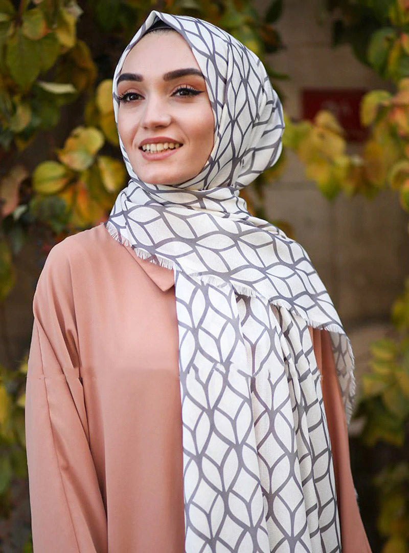 Silver Color Hijab in rich hues, featuring intricate patterns for a sophisticated look, combining style with modesty for the fashion conscious