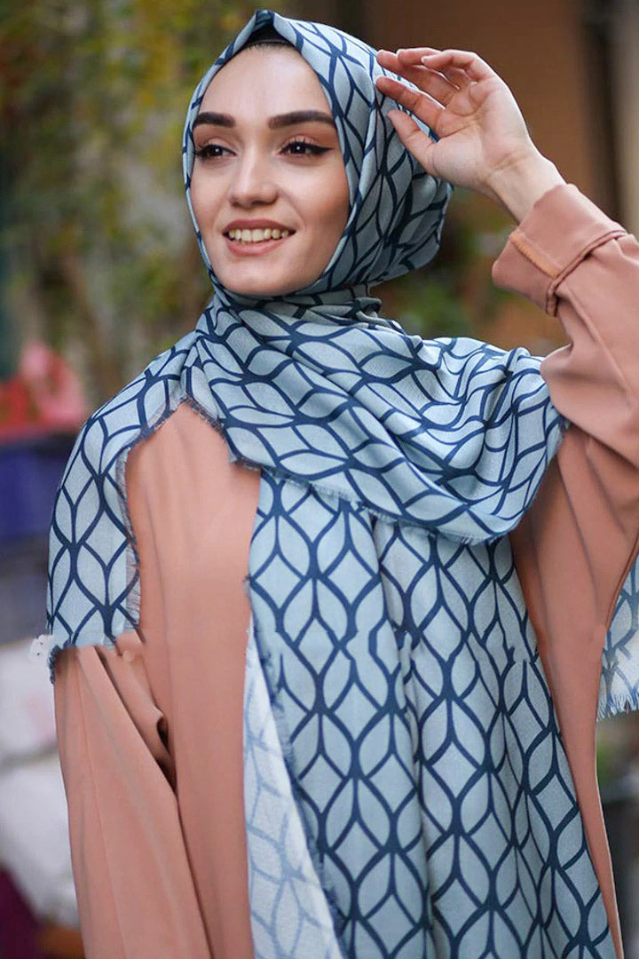 Turquoise Color Hijab in rich hues, featuring intricate patterns for a sophisticated look, combining style with modesty for the fashion conscious