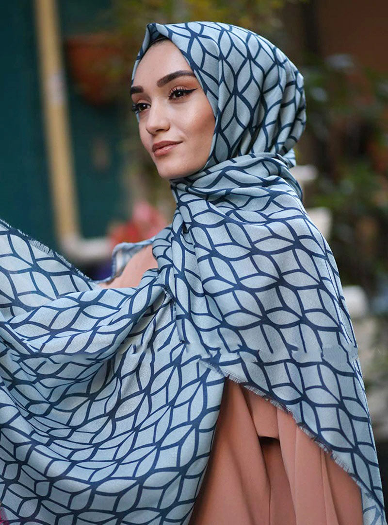 Turquoise Color Hijab in rich hues, featuring intricate patterns for a sophisticated look, combining style with modesty for the fashion conscious