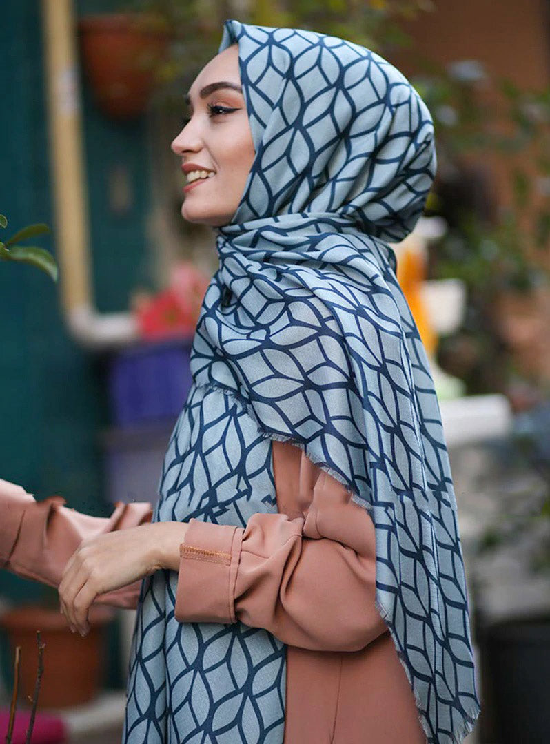 Turquoise Color Hijab in rich hues, featuring intricate patterns for a sophisticated look, combining style with modesty for the fashion conscious