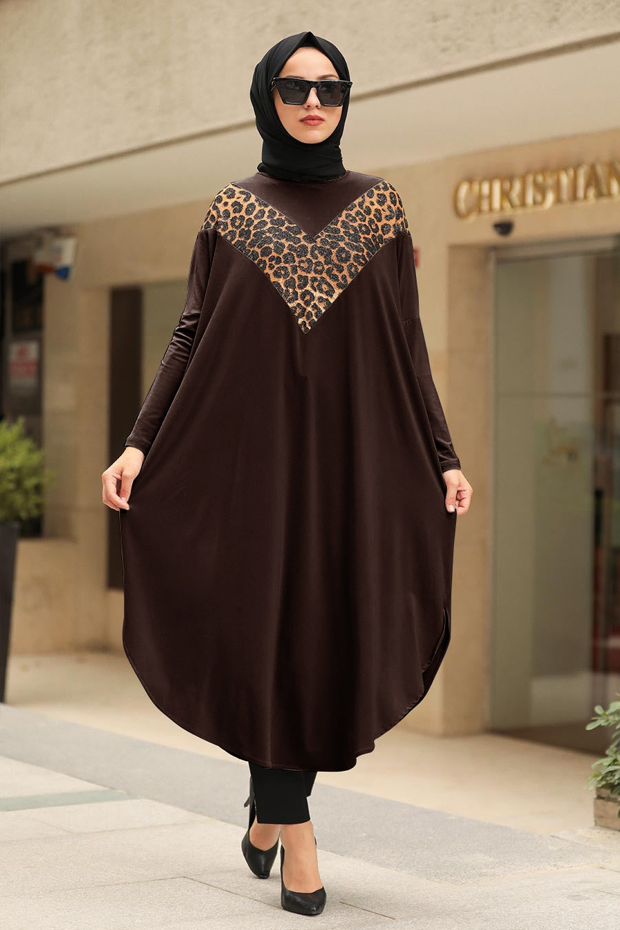 Womens tunic with leopard print accents, available in various colors, perfect for versatile fashion styles
