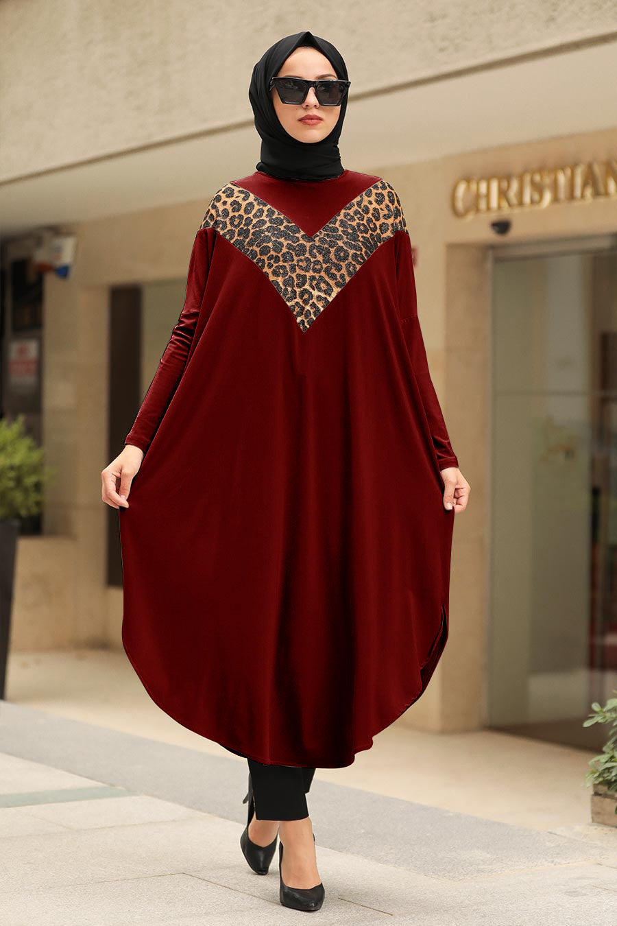 Womens tunic with leopard print accents, available in various colors, perfect for versatile fashion styles