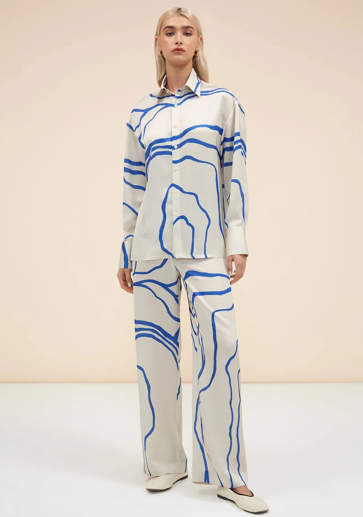 Blue abstract pattern co-ord set with wide leg pants and button up shirt fashionable womenswear 