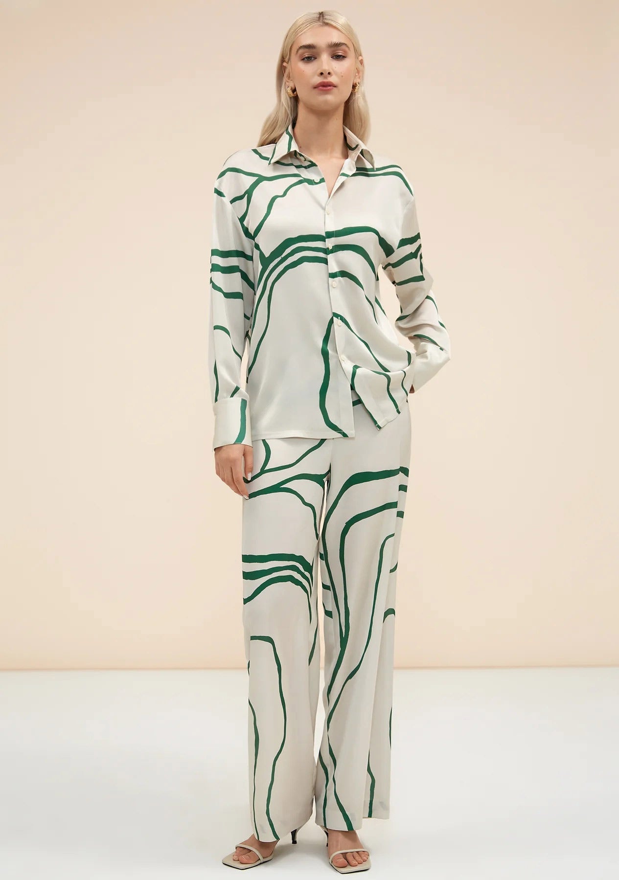 Green abstract pattern co-ord set with wide leg pants and button up shirt fashionable womenswear 