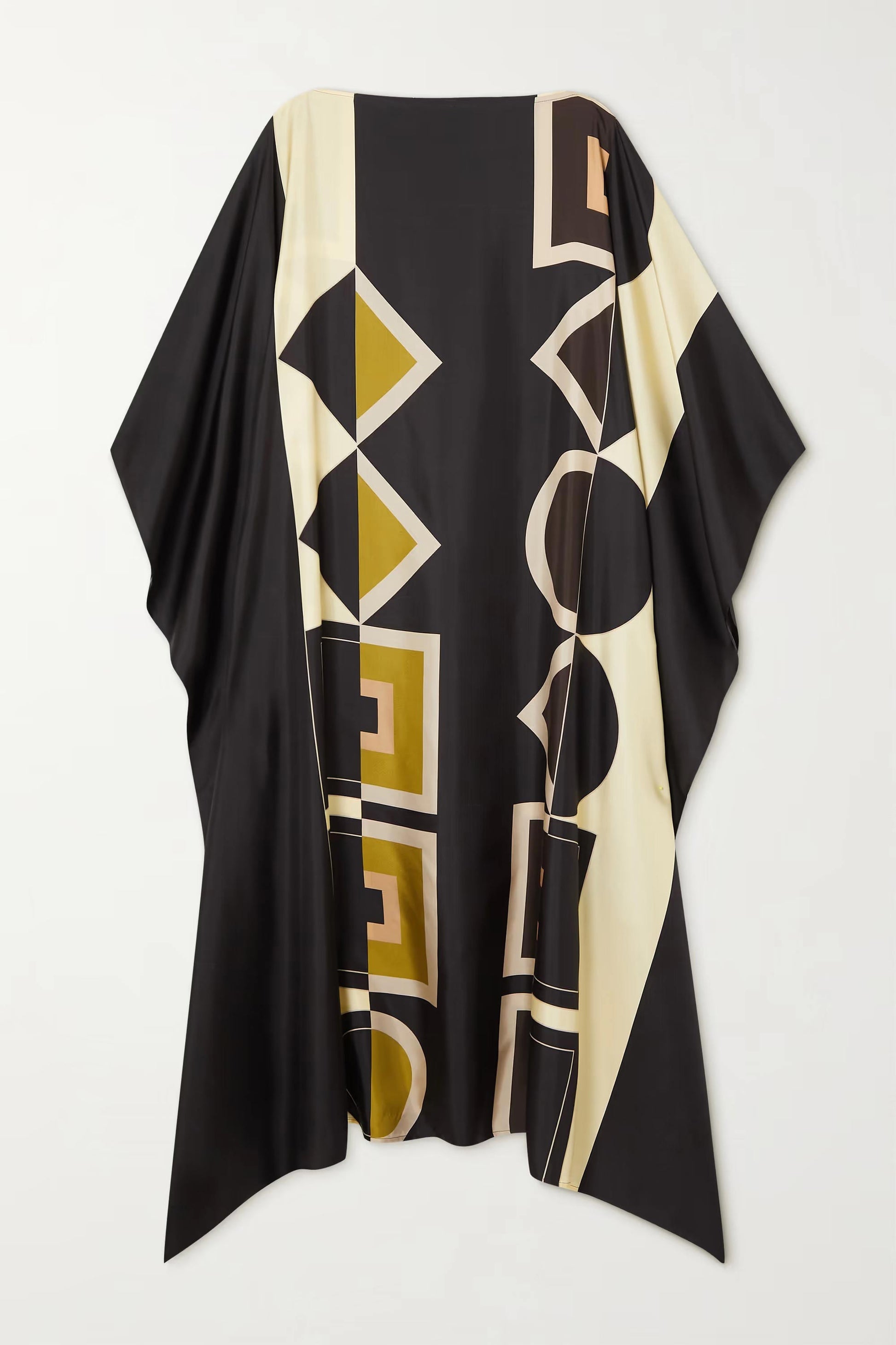 Model wearing black and cream geometric patterned kaftan with waist tie
